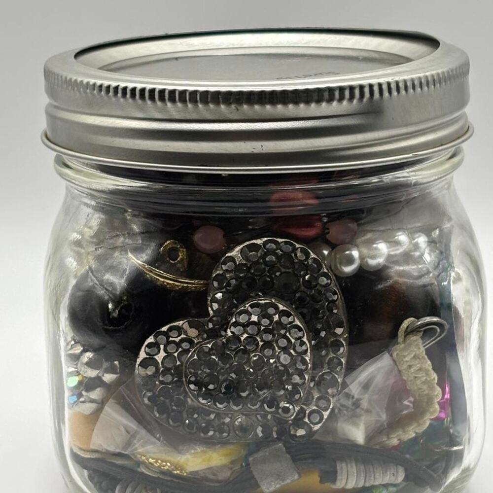 Craft jewelry jar with assorted jewelry